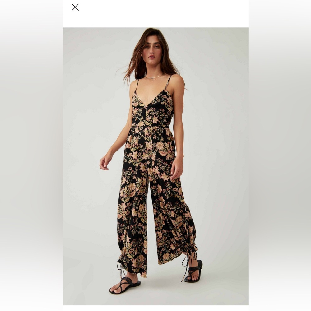 Free People Stand Out Printed Jumpsuit in Black Combo
Such a cute jumpsuit!